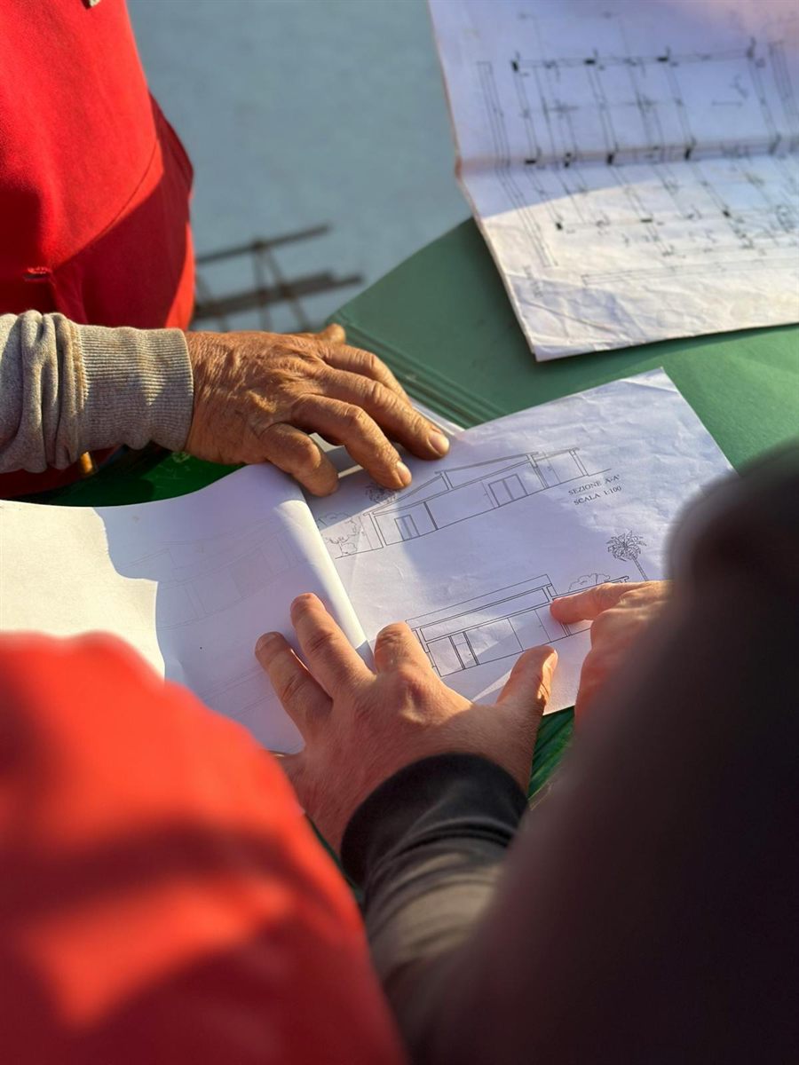 Construction blueprint under review for quotation and drafting support